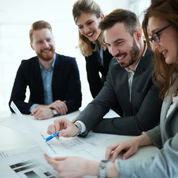 business-people-working-together-on-project-and-brainstorming-in-office.jpg